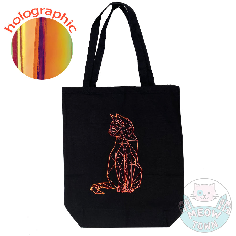 Meow Town Special, designed and printed in the UK by our team exclusively for You. Stylish geometric kitty design with holographic vinyl print. 100% cotton heavy duty black canvas tote bag.